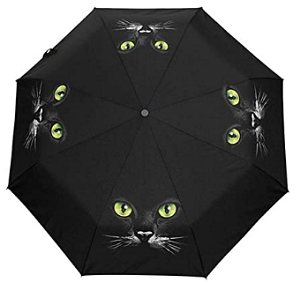 Paraguas negro con cara de gato con ojos verdes 